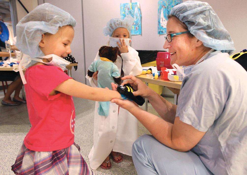 OR Nurse interacting with the Children