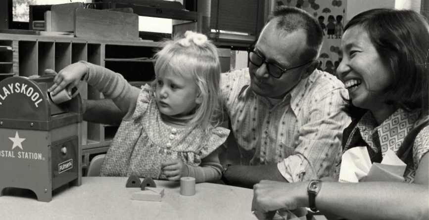 Joan Chan with caregiver and child