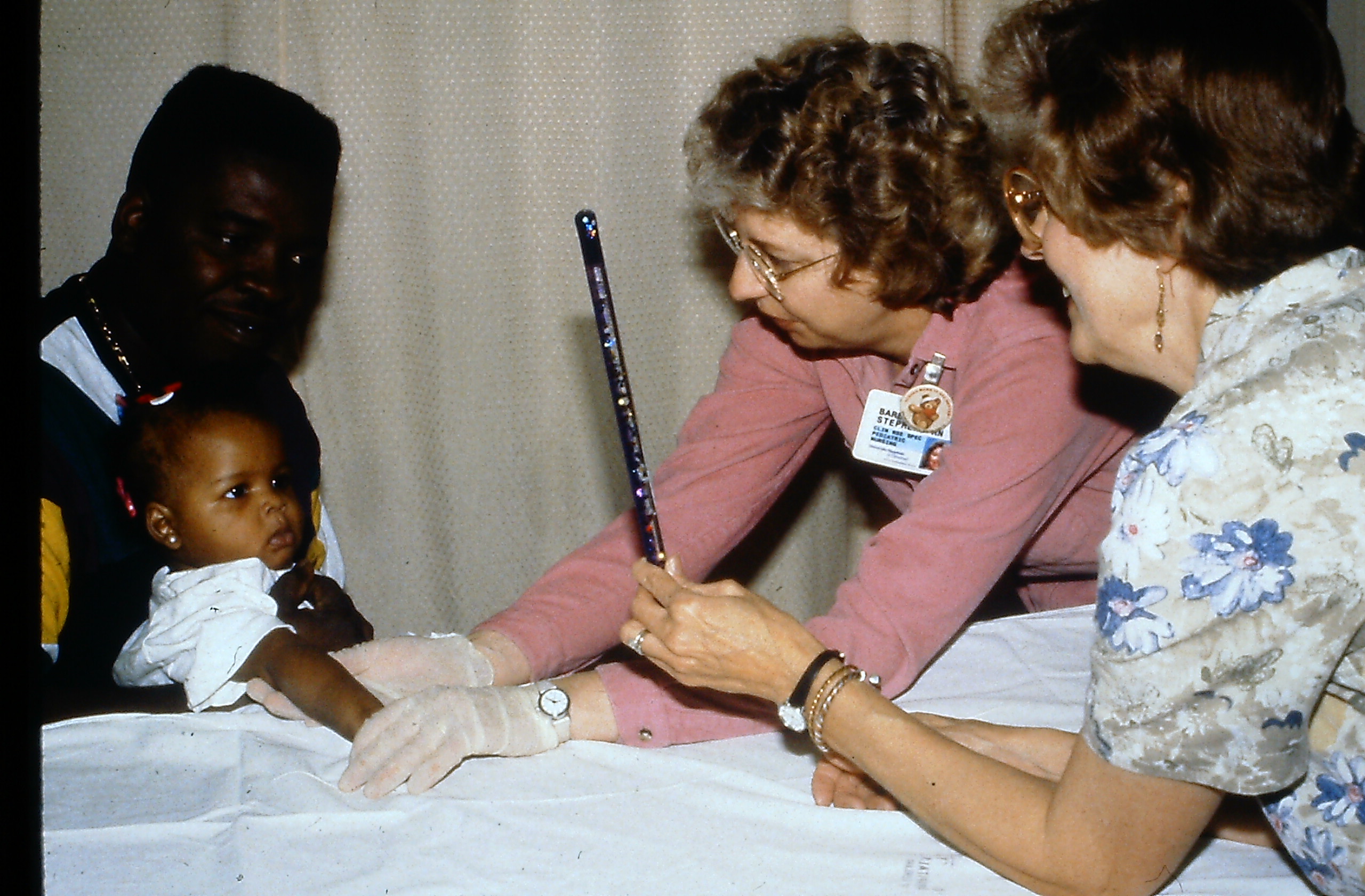MEB &amp; Barbara Stephens, RN (Comfort Positioning ; back-to-chest ; distraction ; treatment room) (1)